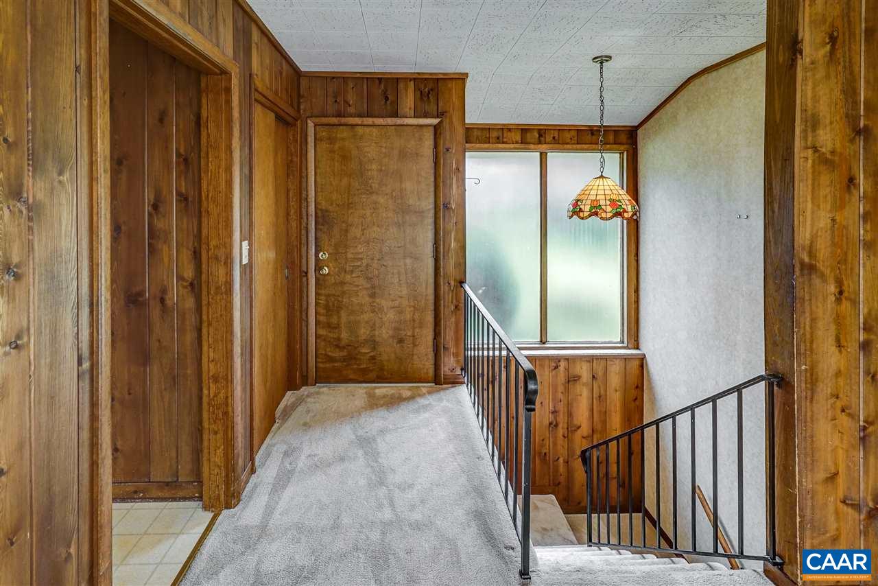 1159 Wolf Trap Road Charlottesville, VA 22911 - Photo 7 of 50 a view of a bathroom with a glass door shower and door