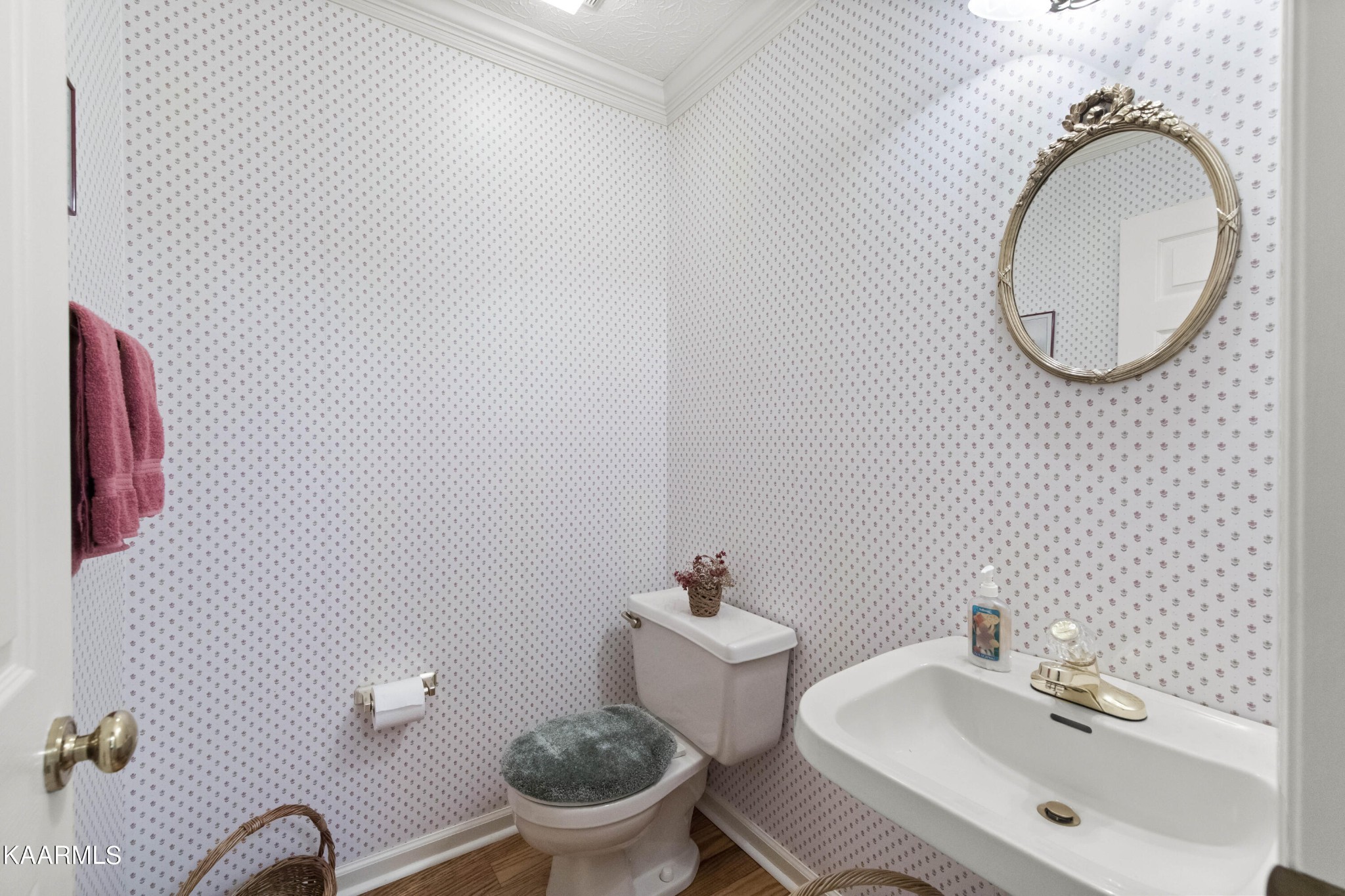 291 Lone Ridge Lane Clinton, TN 37716 - Photo 16 of 30 a bathroom with a sink mirror and toilet