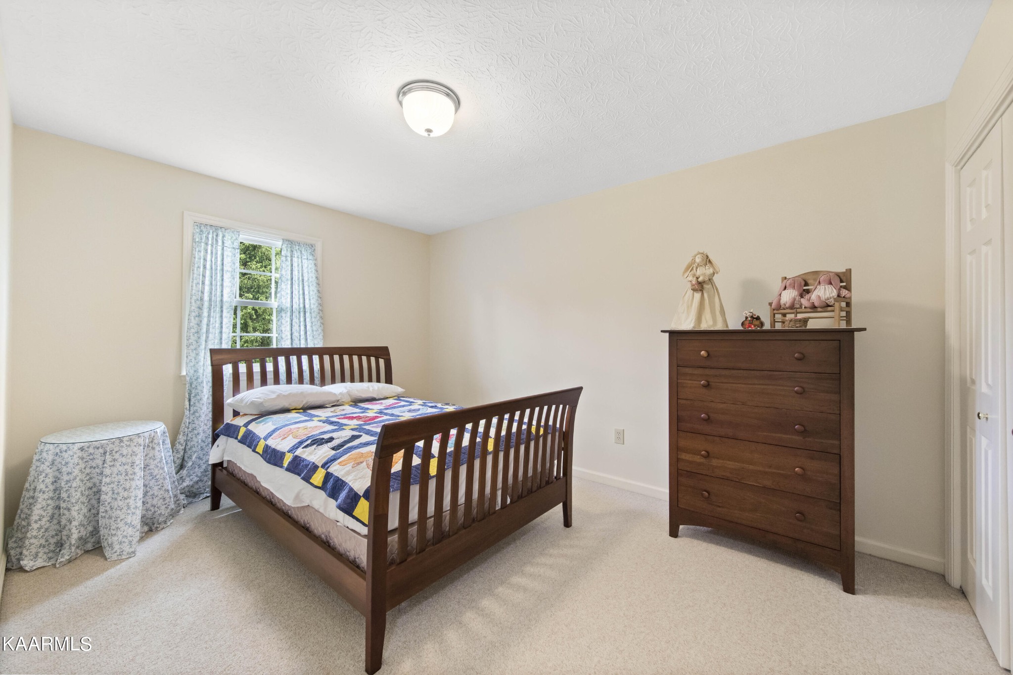 291 Lone Ridge Lane Clinton, TN 37716 - Photo 18 of 30 a bedroom with a bed and a window