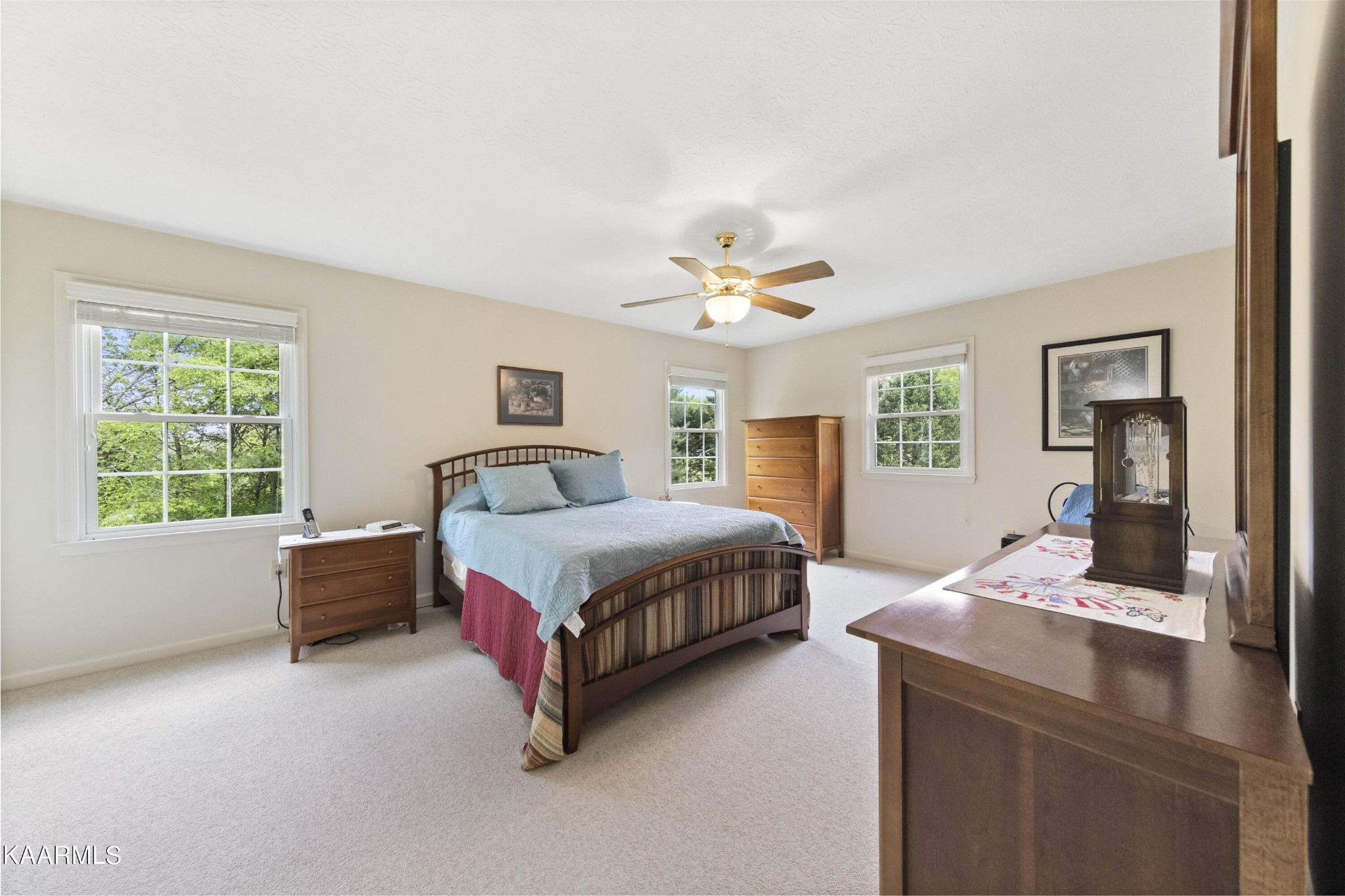 291 Lone Ridge Lane Clinton, TN 37716 - Photo 21 of 30 a bedroom with a bed and a table chair