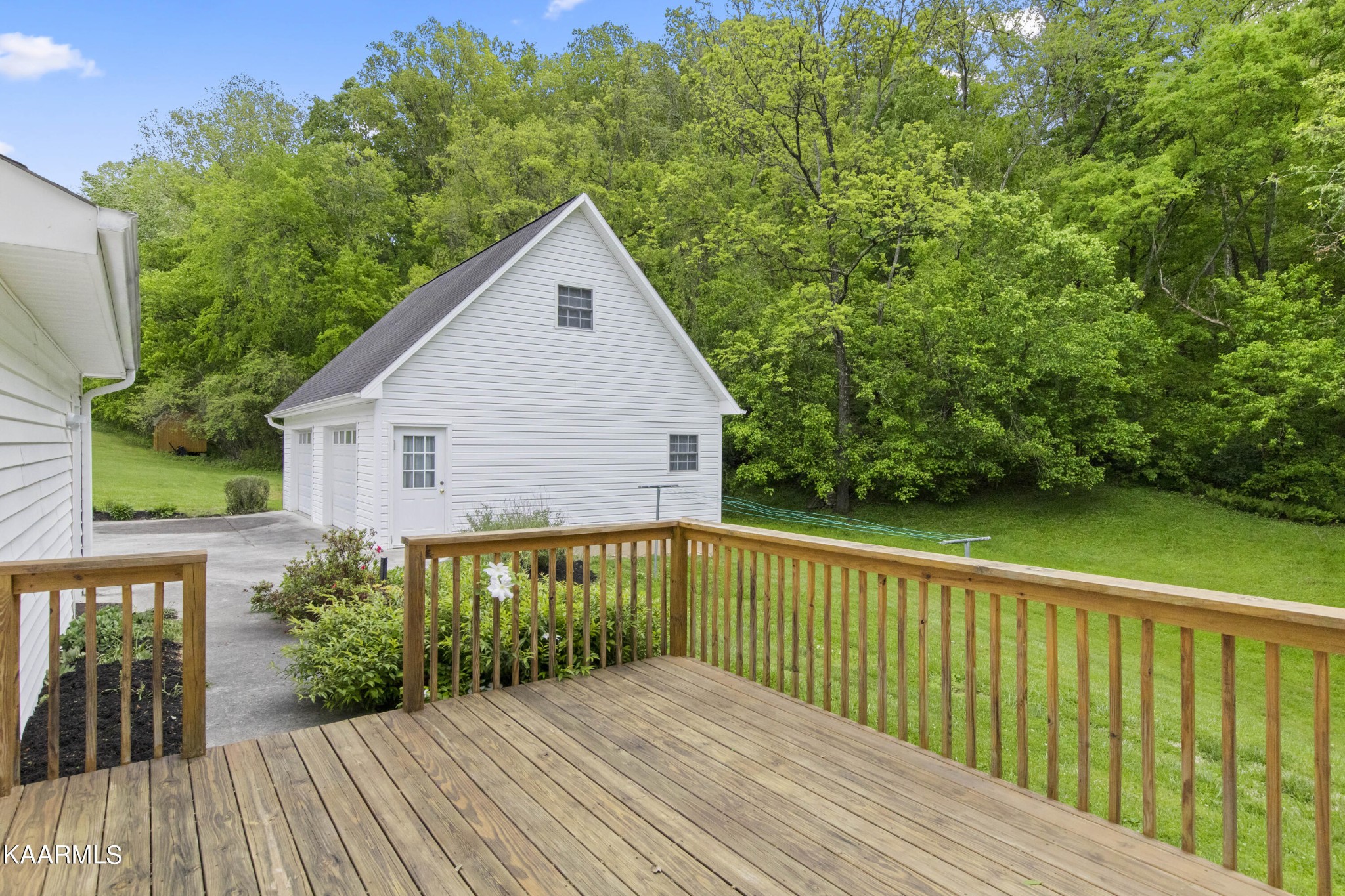 291 Lone Ridge Lane Clinton, TN 37716 - Photo 28 of 30 a view of a house with a yard