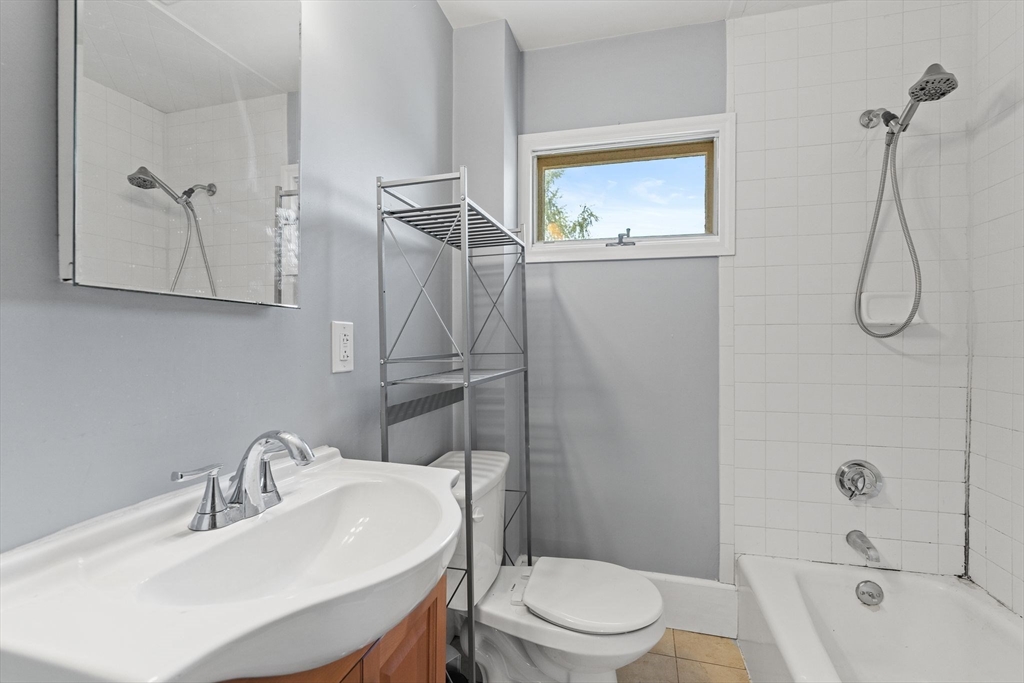 7 Carter Road Braintree, MA 02184 - Photo 29 of 42 a bathroom with a sink toilet and shower