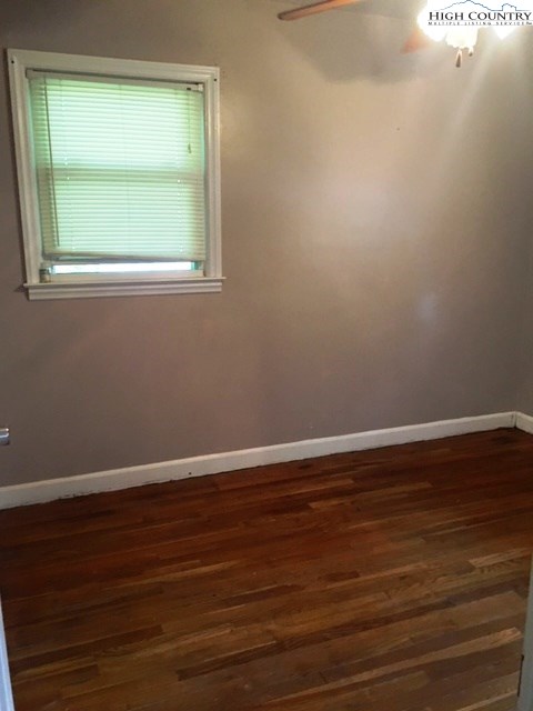 501 Oak Street Boone, NC 28607 - Photo 8 of 12 a view of a small space with wooden floor and a window
