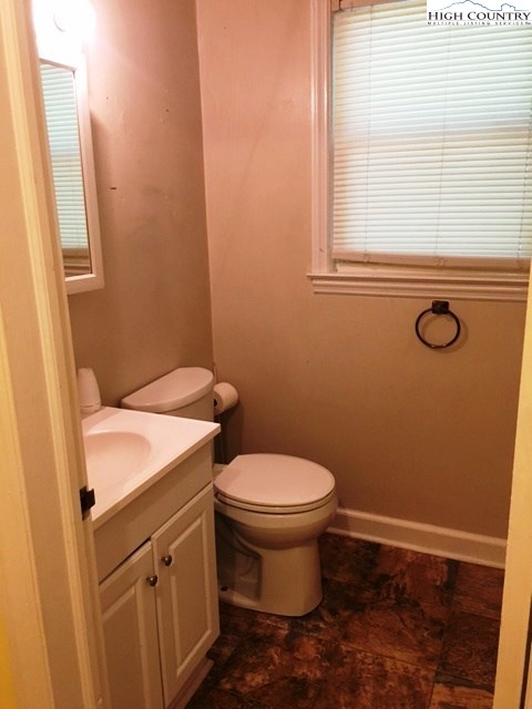 501 Oak Street Boone, NC 28607 - Photo 9 of 12 a bathroom with a sink and a toilet