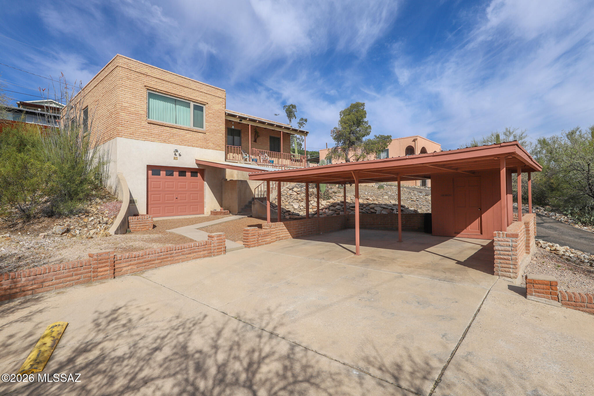 37 North Silverbell Road Tucson, AZ 85745 - Photo 2 of 31 a view of a house with a slide