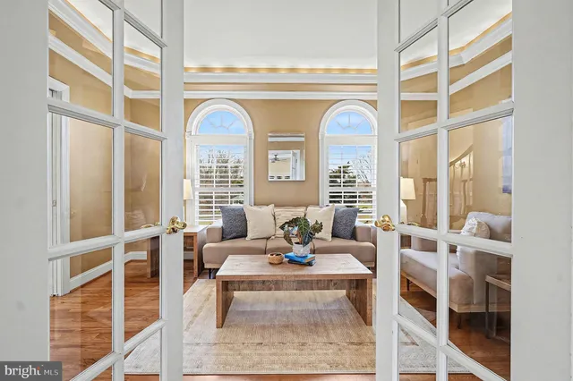 a spacious bathroom with sinks mirror and a bathtub