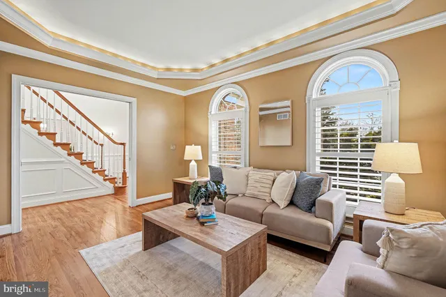 a bedroom with a bed and ceiling fan