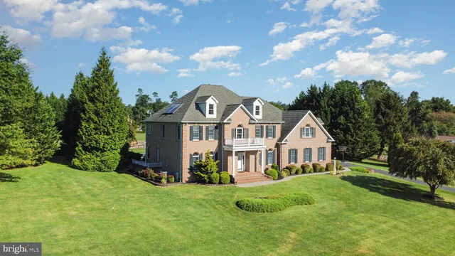a view of a yard with an outdoor seating