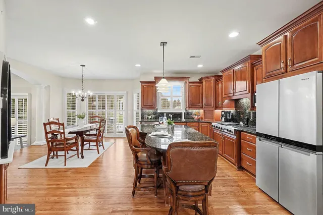 a view of a storage and utility room with washer and dryer