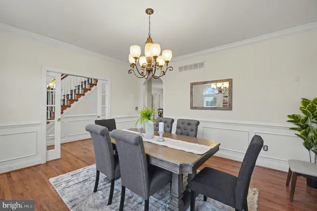 an aerial view of a house with a yard and plants