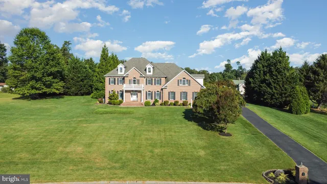 a view of a house with a big yard