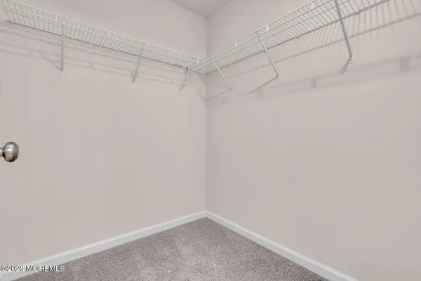 a view of a room with racks on the wall