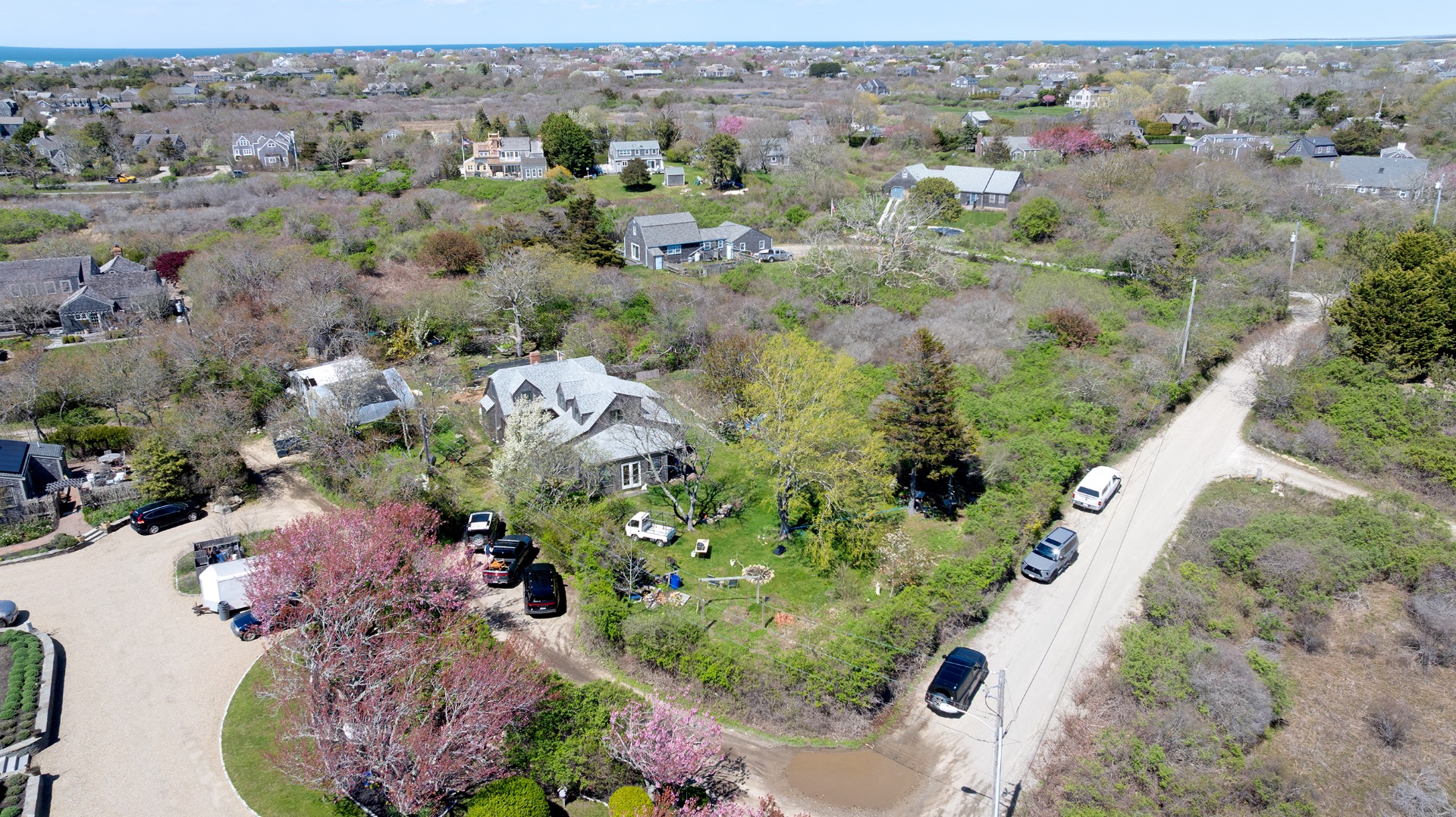 23 Dukes Road Nantucket, MA 02554 - Photo 5 of 6 an aerial view of waterside residential houses with outdoor space