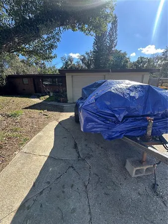 a view of a yard with an outdoor space