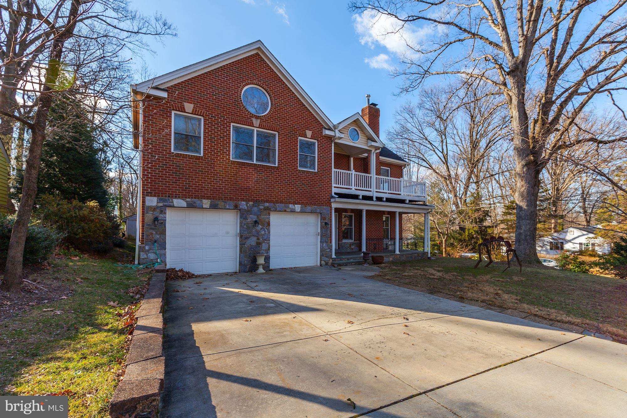 3406 Glorus Place Silver Spring, MD 20902 - Photo 2 of 53 a front view of a house with a yard