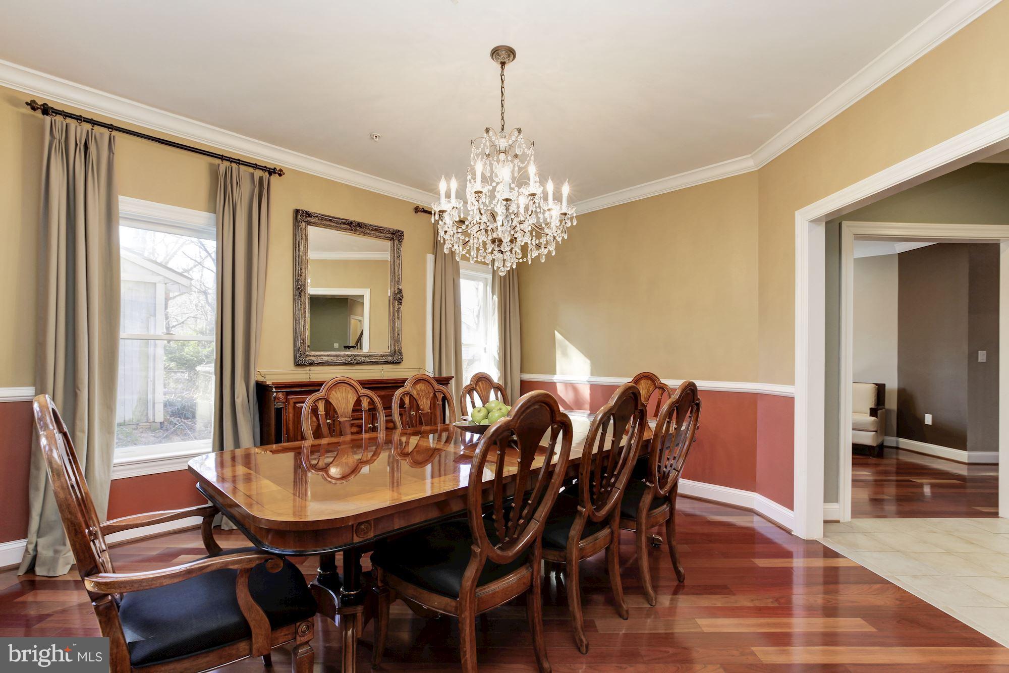 3406 Glorus Place Silver Spring, MD 20902 - Photo 11 of 53 a view of a dining room with furniture and chandelier