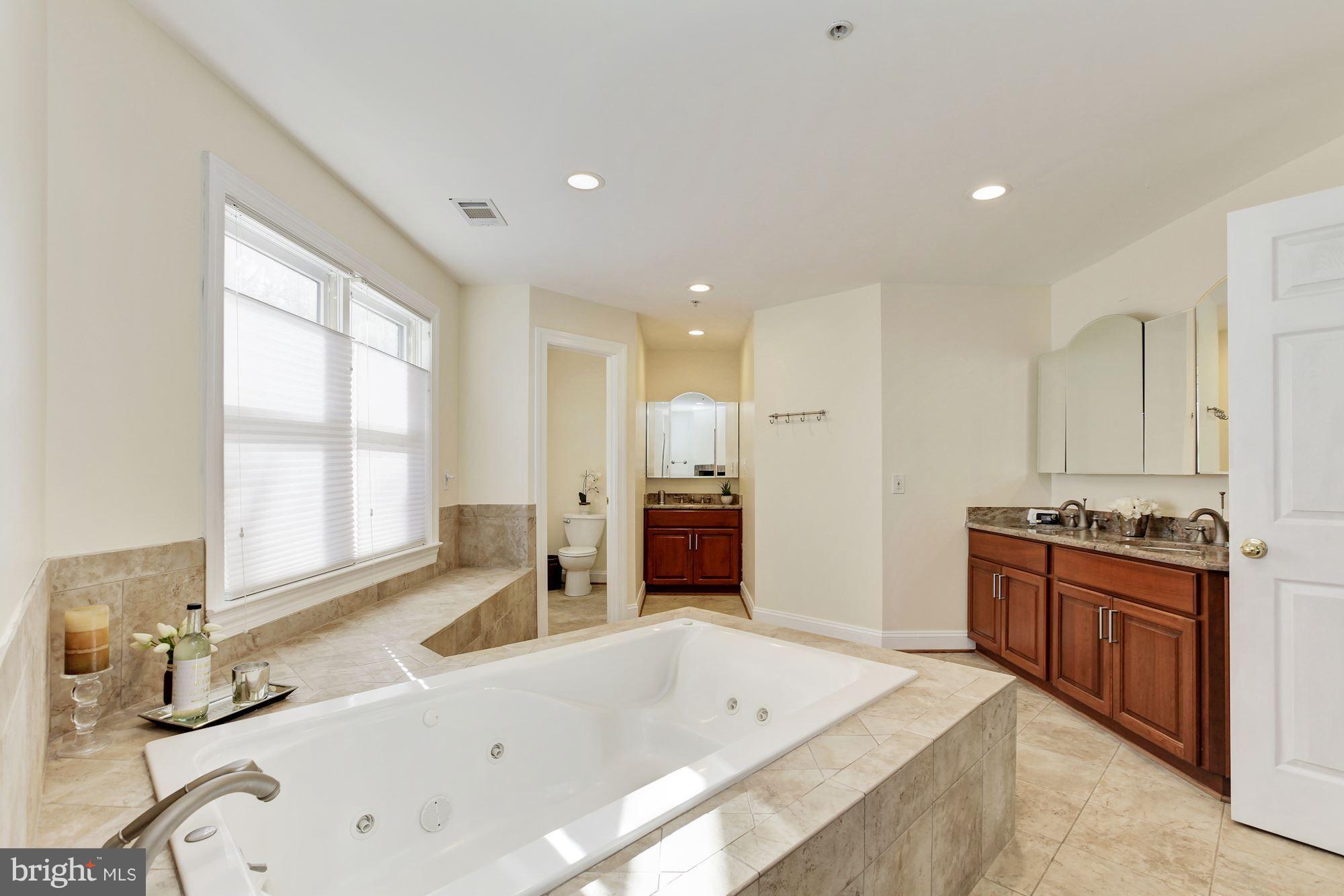 3406 Glorus Place Silver Spring, MD 20902 - Photo 27 of 53 a large white kitchen with a large window