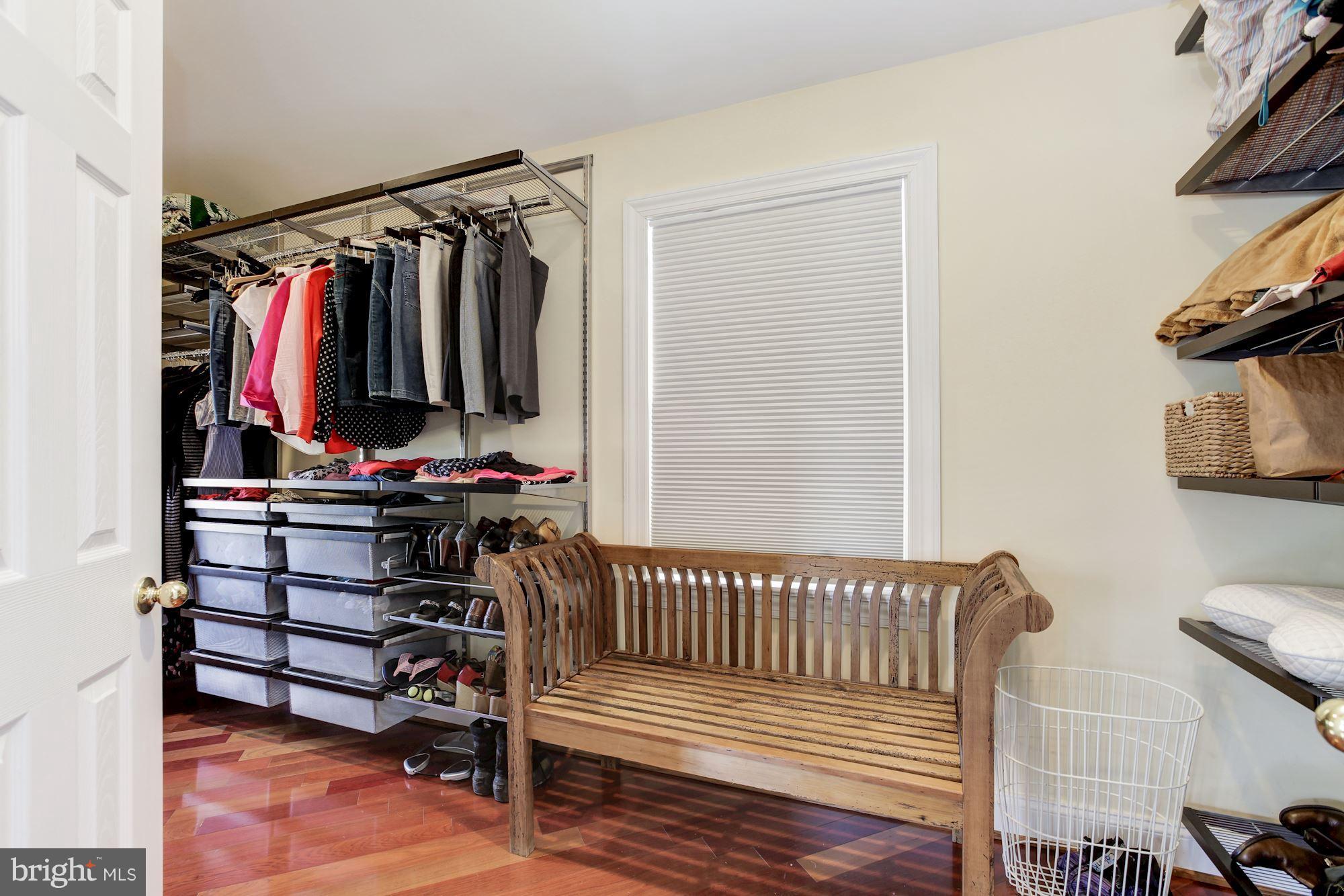3406 Glorus Place Silver Spring, MD 20902 - Photo 29 of 53 a view of walk in closet with clothes and shoes