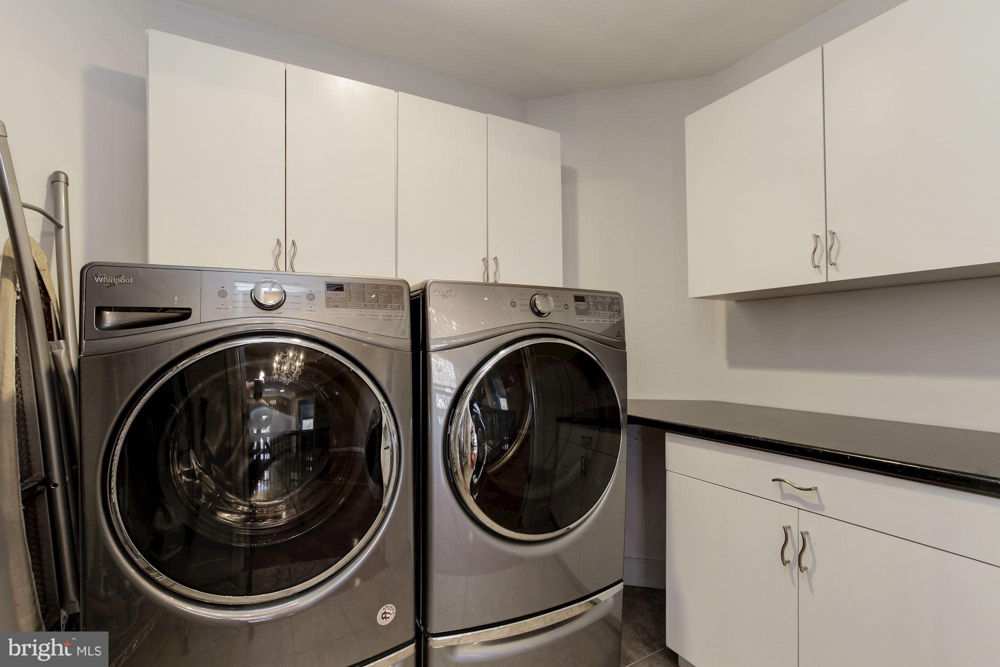 3406 Glorus Place Silver Spring, MD 20902 - Photo 30 of 53 a utility room with dryer and washer