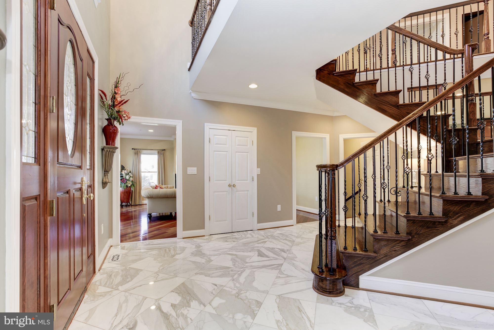 3406 Glorus Place Silver Spring, MD 20902 - Photo 4 of 53 a view of an entryway with staircase