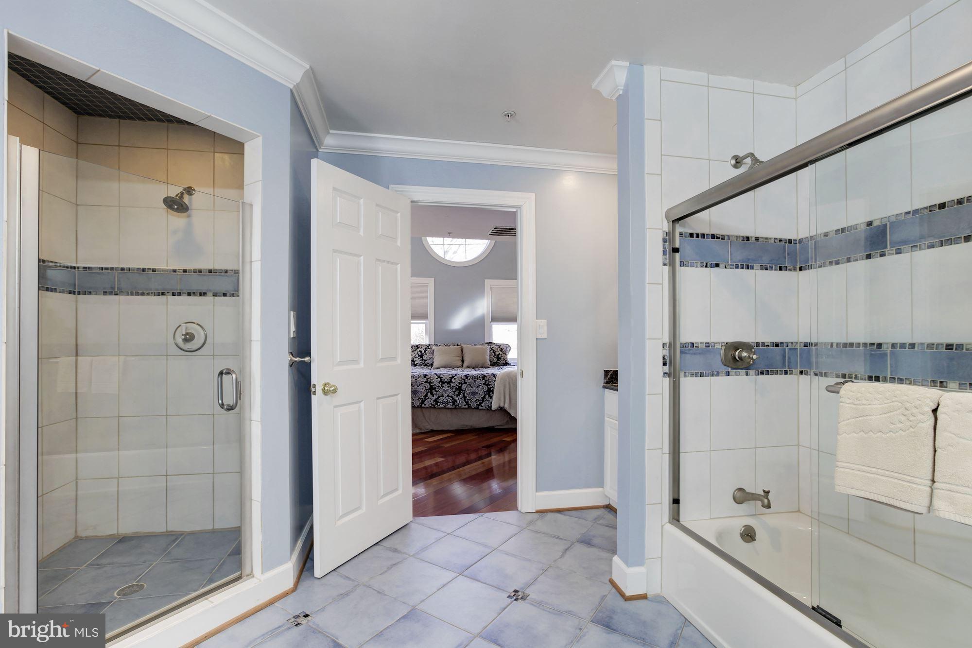 3406 Glorus Place Silver Spring, MD 20902 - Photo 34 of 53 a bathroom with a shower and a bath tub