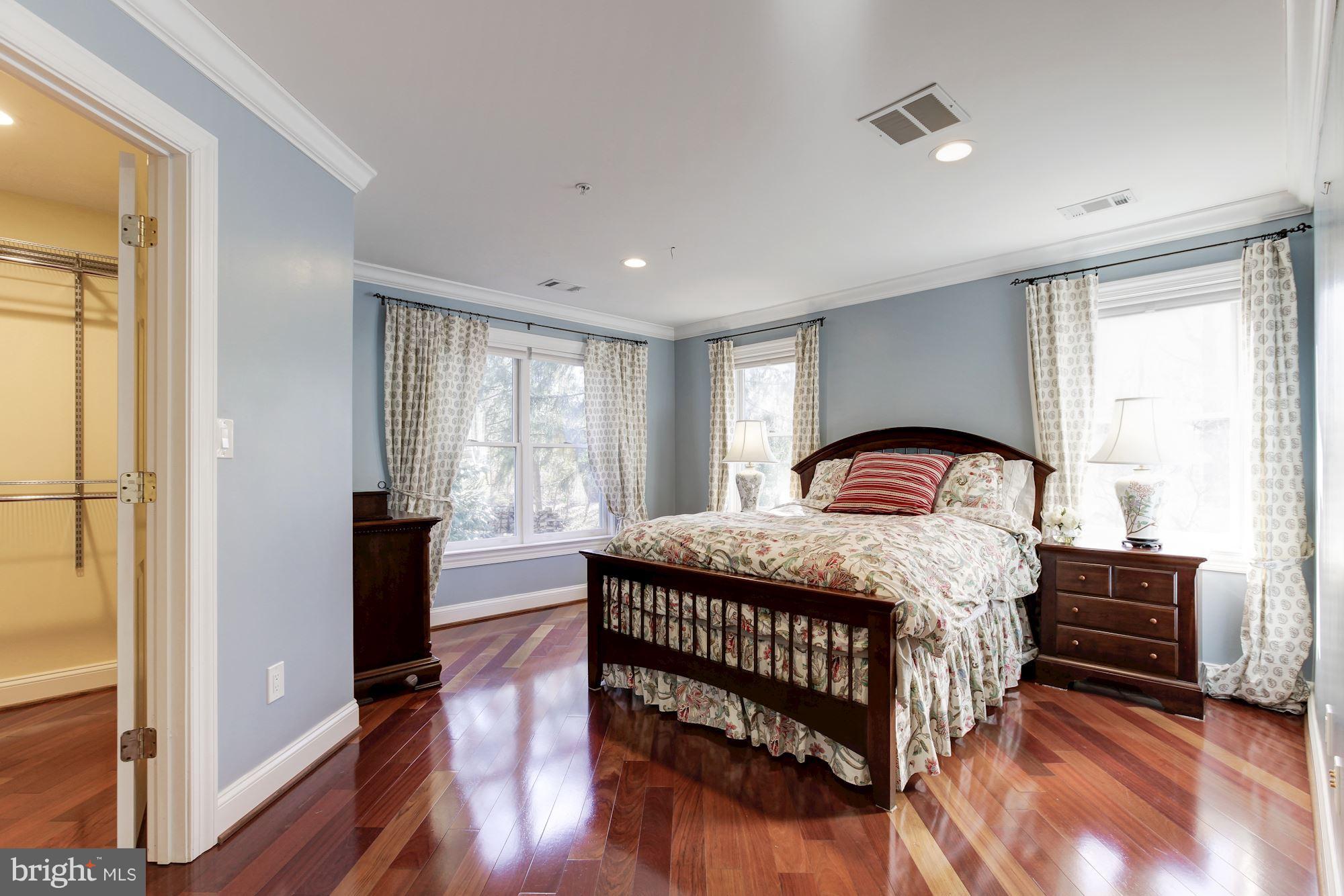3406 Glorus Place Silver Spring, MD 20902 - Photo 36 of 53 a bedroom with a bed and a large window