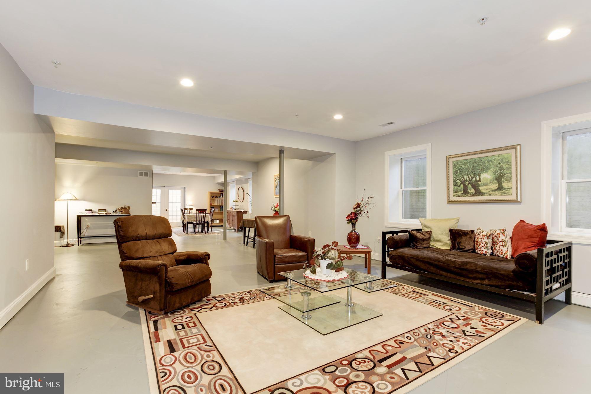 3406 Glorus Place Silver Spring, MD 20902 - Photo 42 of 53 a living room with furniture a rug and a window