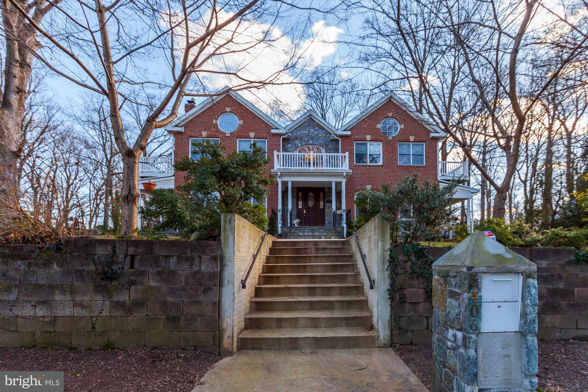 3406 Glorus Place Silver Spring, MD 20902 - Photo 53 of 53 a front view of a house with a garden