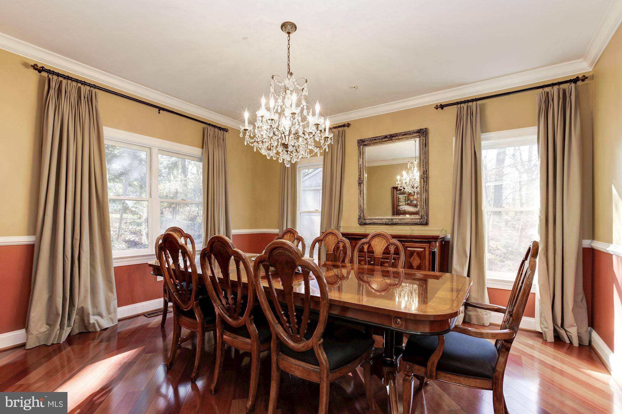 3406 Glorus Place Silver Spring, MD 20902 - Photo 10 of 53 a view of a dining room with furniture and windows