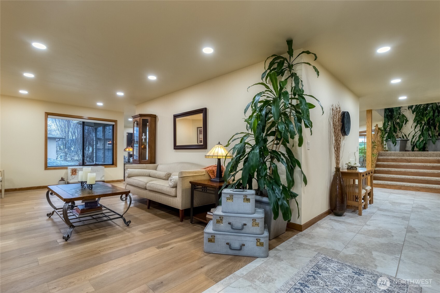1343 Highland Road Walla Walla, WA 99362 - Photo 6 of 40 a living room with furniture gym equipment and a potted plant