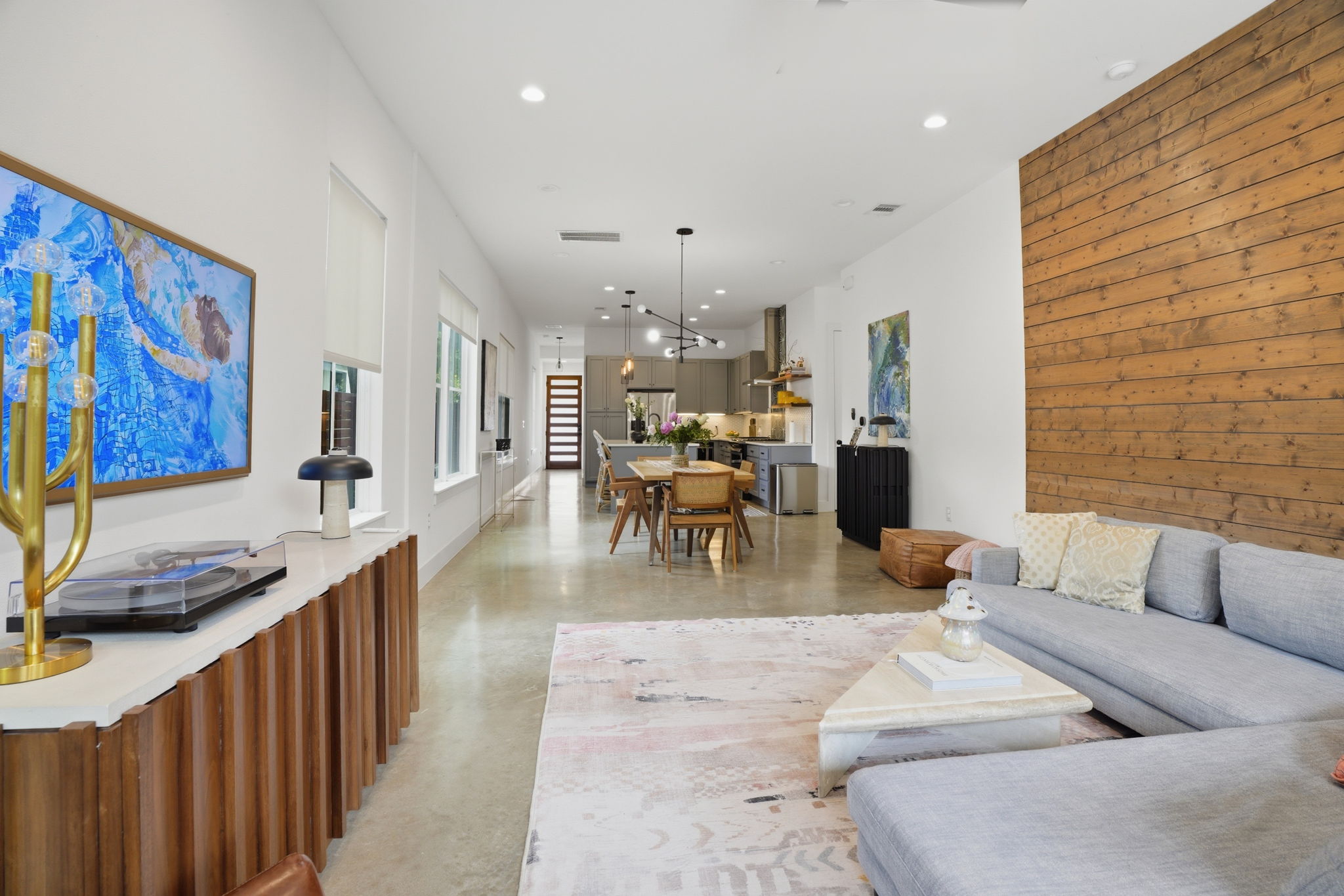 4609 Sara Drive, Unit B Austin, TX 78721 - Photo 39 of 39 An open floorplan seamlessly connects the living room, dining area, and kitchen, creating an ideal space for entertaining.