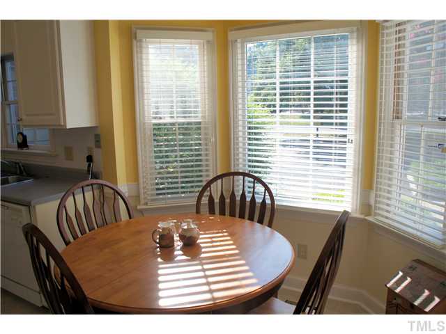 8434 Wycombe Lane Raleigh, NC 27615 - Photo 5 of 19 Enjoy breakfast room with bay window and a cheery place for coffee or breakfast.