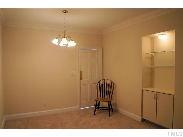 8434 Wycombe Lane Raleigh, NC 27615 - Photo 7 of 19 Formal dining room area has built-ins and access to the kitchen.