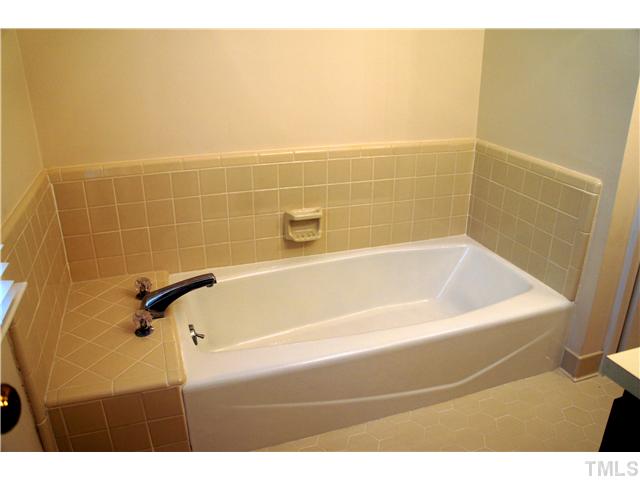 8434 Wycombe Lane Raleigh, NC 27615 - Photo 10 of 19 Master bath has a separate tub.