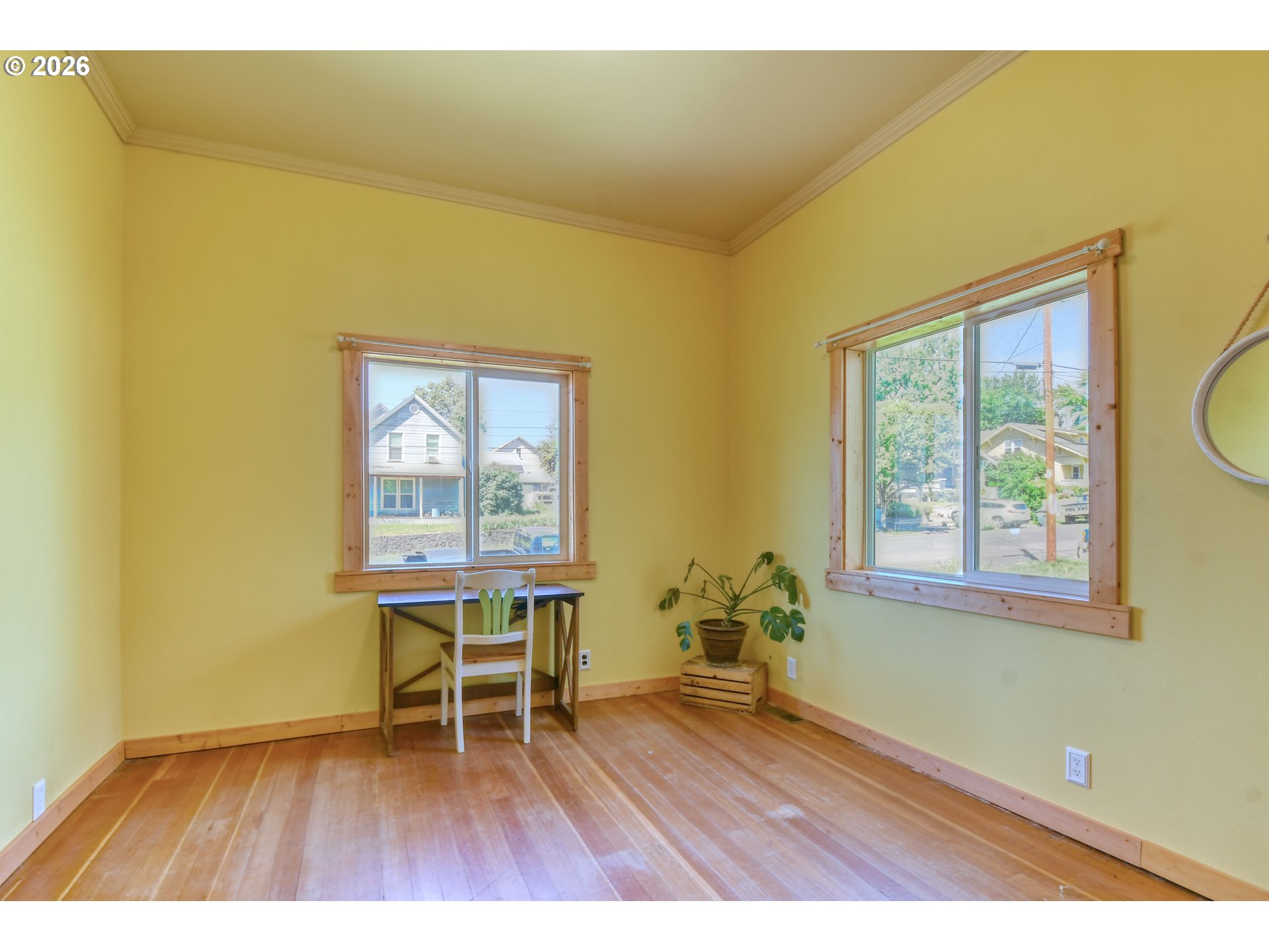 402-404 Northwest 7th Street Pendleton, OR 97801 - Photo 14 of 38 a workspace with wooden floor and a window