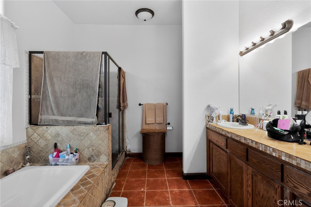 11701 Back Canyon Road Caliente, CA 93518 - Photo 20 of 26 a bathroom with a sink and a mirror
