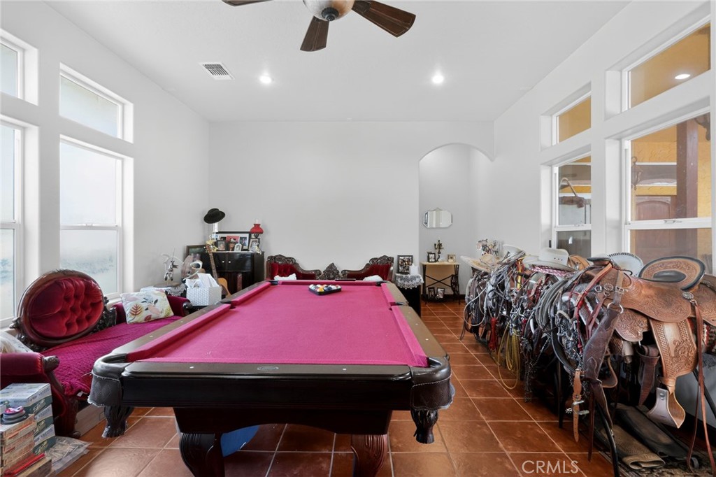 11701 Back Canyon Road Caliente, CA 93518 - Photo 21 of 26 a bed room with furniture and a window