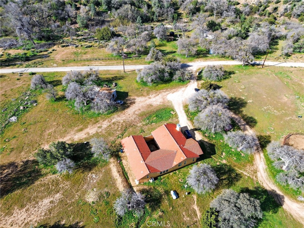 11701 Back Canyon Road Caliente, CA 93518 - Photo 5 of 26 an aerial view of residential house with yard and lake view