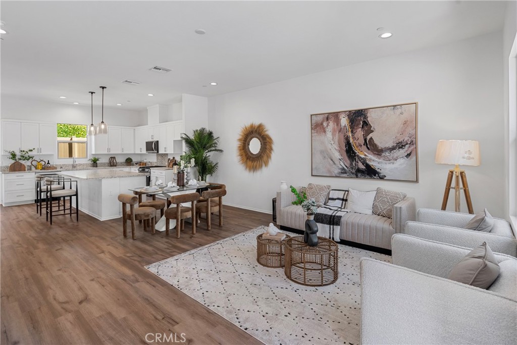 816 Francesca Drive Walnut, CA 91789 - Photo 3 of 14 a living room with furniture kitchen view and a wooden floor