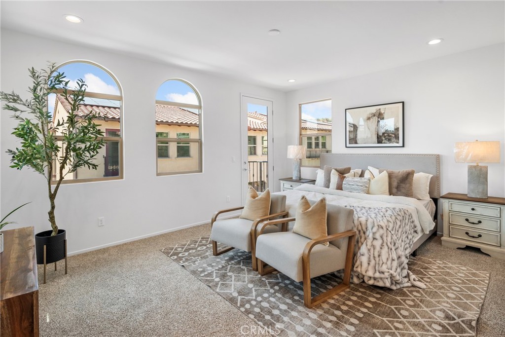 816 Francesca Drive Walnut, CA 91789 - Photo 8 of 14 a spacious bedroom with a bed and a chandelier