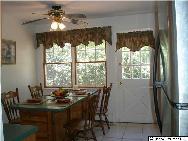 76 Yellow Meetinghouse Road Cream Ridge, NJ 08514 - Photo 3 of 3 a view of a dining room with furniture window and outside view