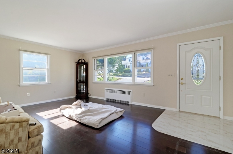 6 Roscoe Avenue Madison, NJ 07940 - Photo 4 of 8 a living room with wooden floor and window