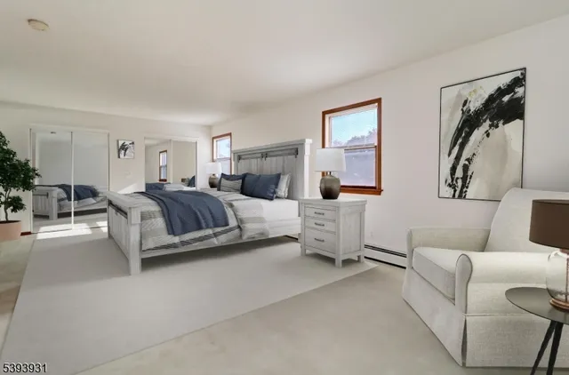 a living room with furniture and a lamp