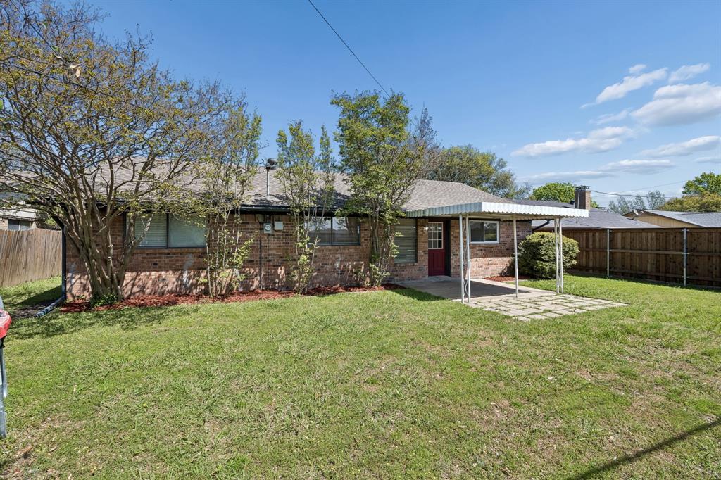 709 Bowie Street Forney, TX 75126 - Photo 25 of 27 a front view of a house with a yard