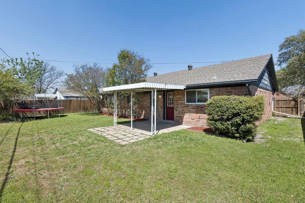 709 Bowie Street Forney, TX 75126 - Photo 4 of 27 a view of a house with backyard and porch
