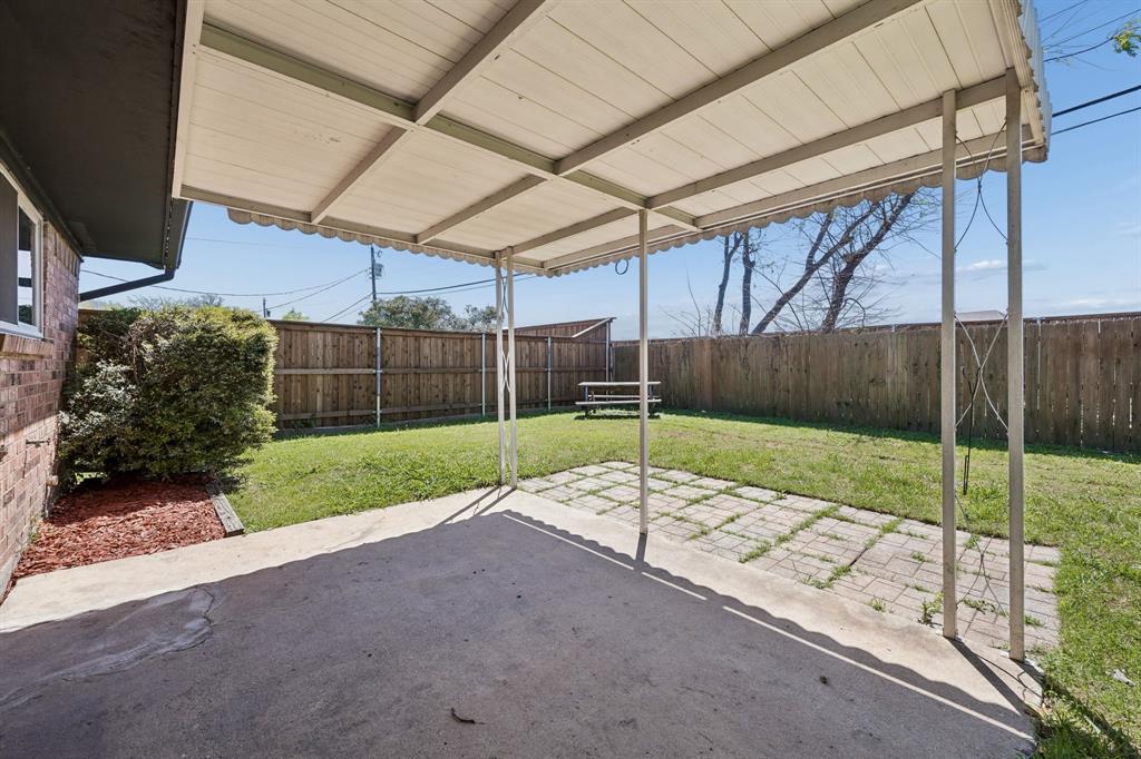 709 Bowie Street Forney, TX 75126 - Photo 5 of 27 a view of a backyard