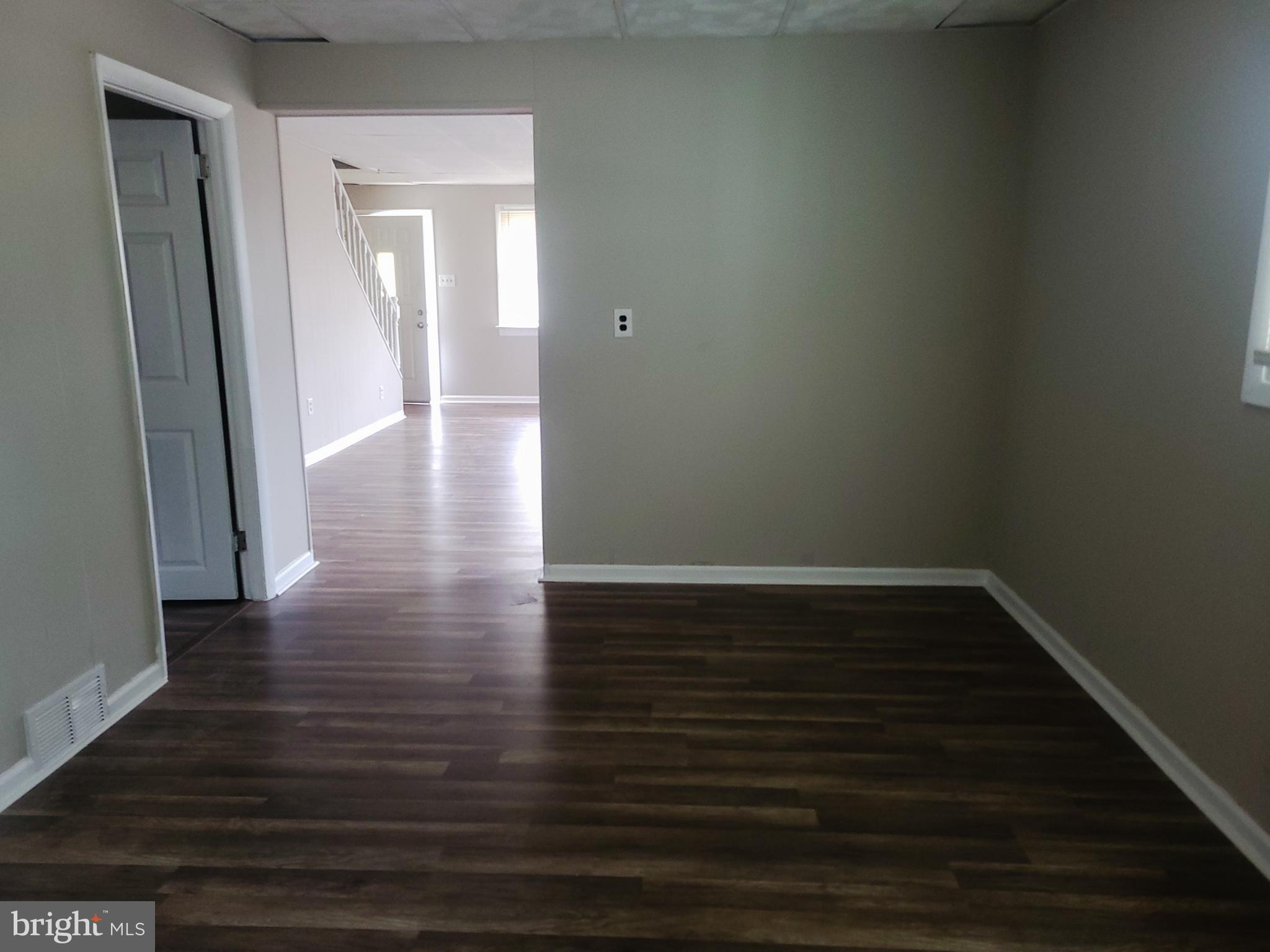 601 Division Street Gloucester City, NJ 08030 - Photo 4 of 4 a view of a hallway with wooden floor