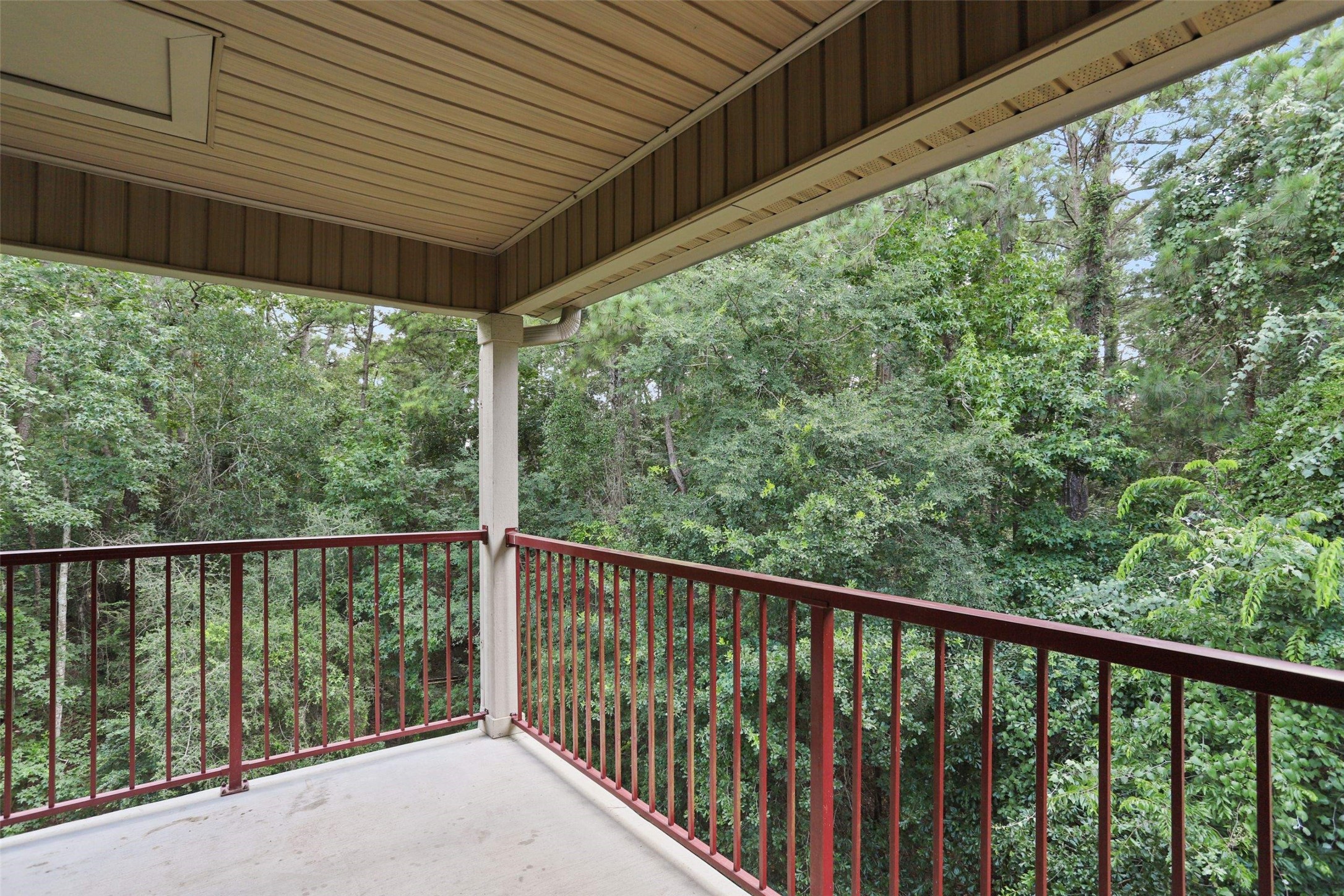11700 League Line Road, Unit 122 Conroe, TX 77304 - Photo 12 of 25 a view of a balcony with outdoor space