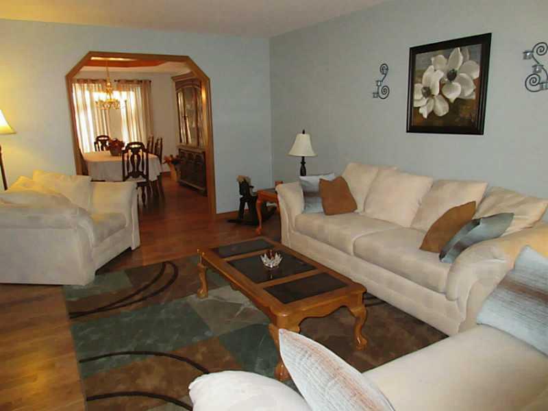 Living Room. View from living room into dining room.  Living Room was just painted.