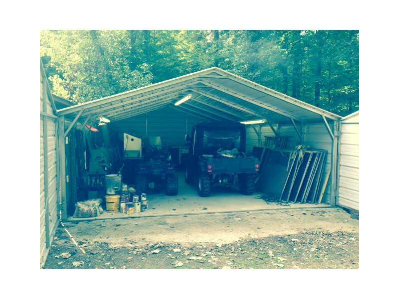 105 Cravener Road Apollo, PA 15613 - Photo 22 of 25 Parking Lot/Garage. 18 x 26 steel building garage with electric and concrete flooring.
